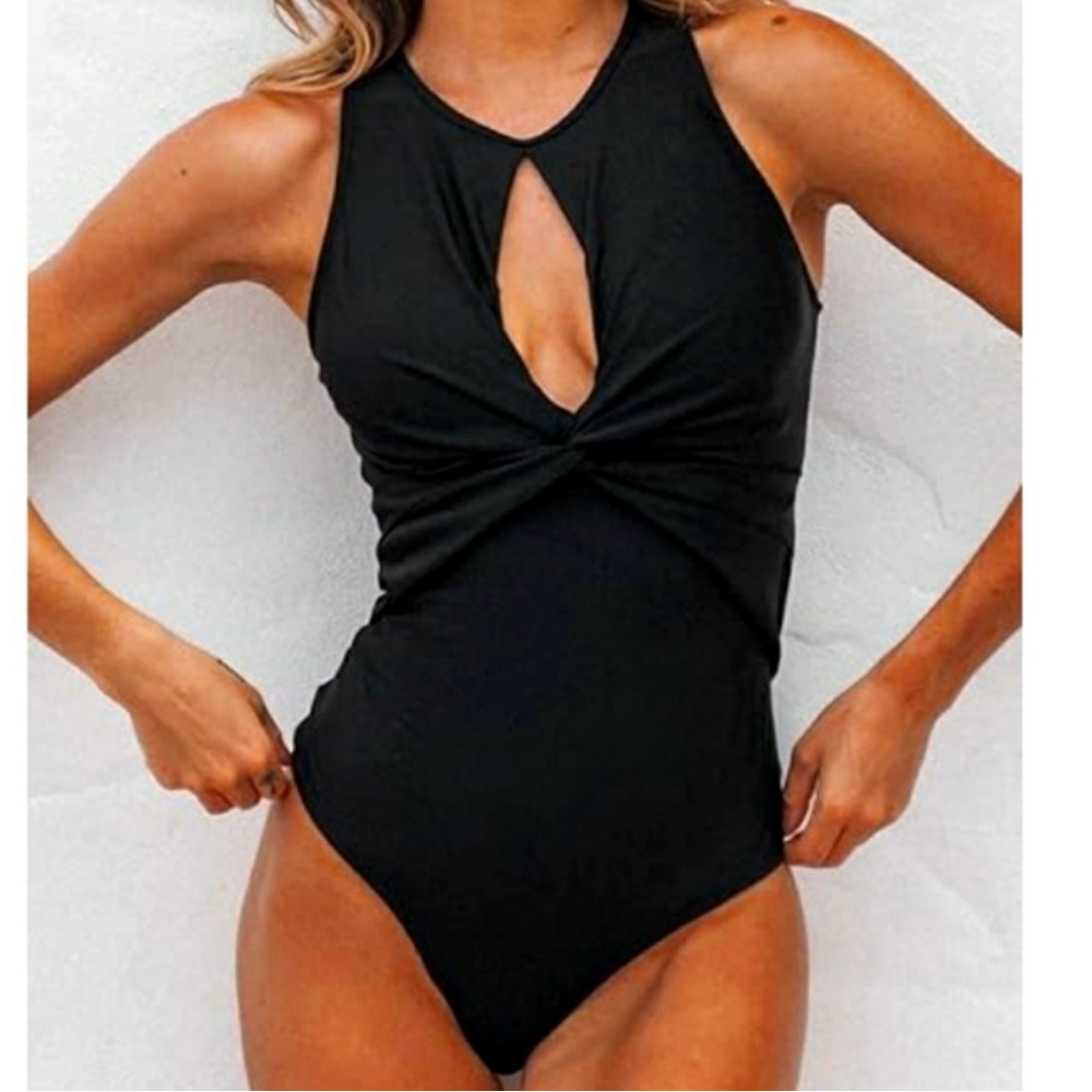 One Piece Cutout Twisted Front
(NWT)
Backless Round Neck Bathing Suit black